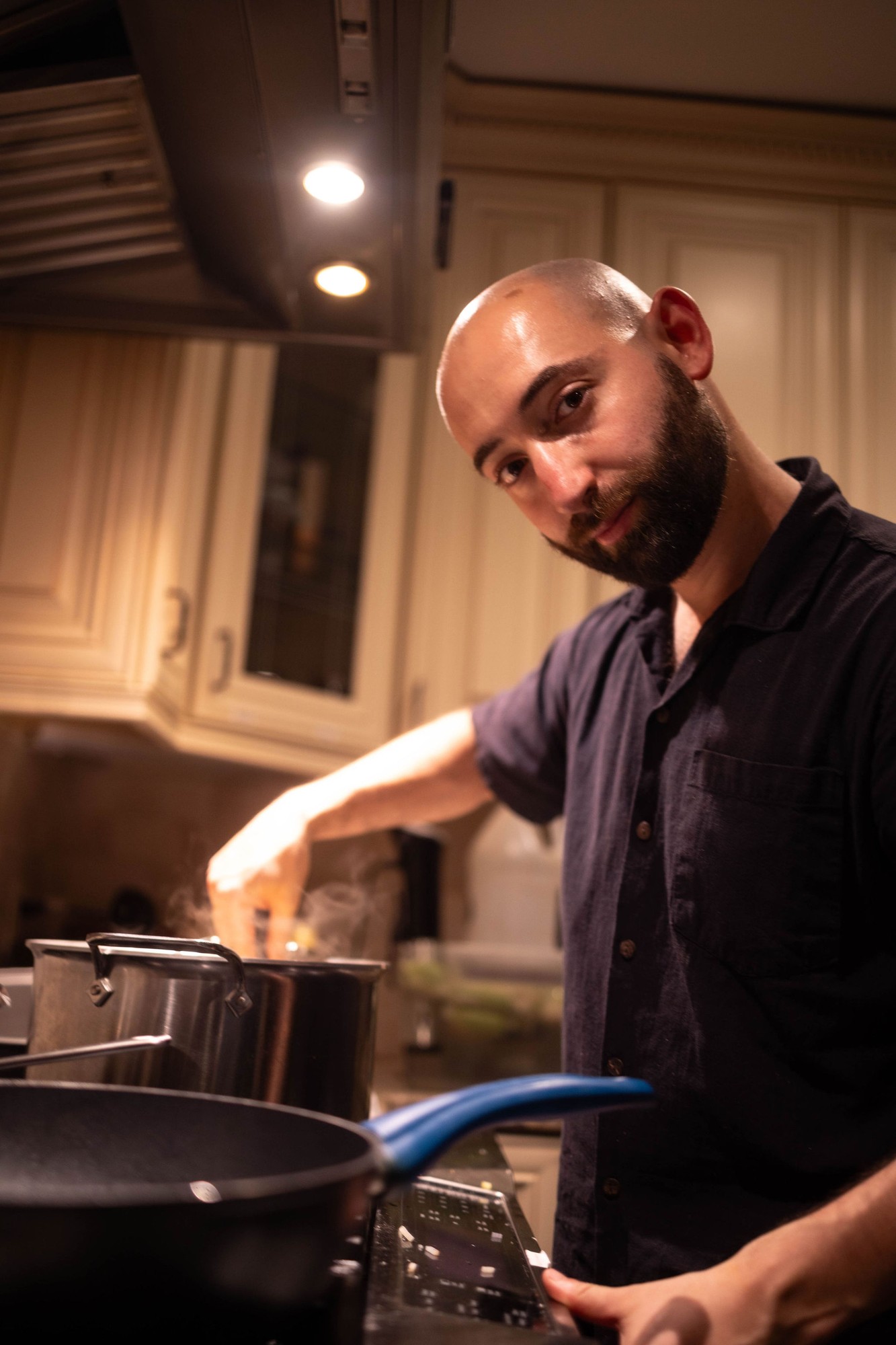 Chef Zen Gabriel cooking at the stove